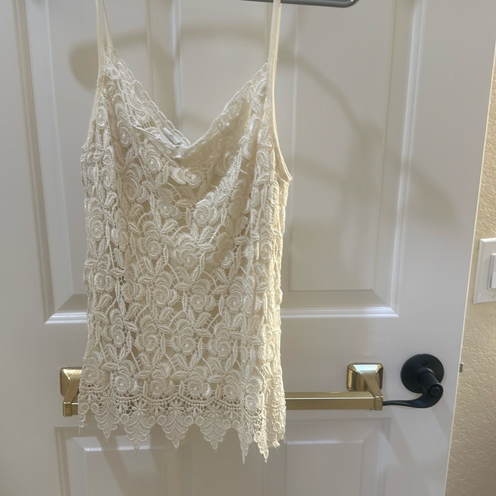 Embroidered top double lined, spaghetti straps size large